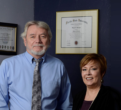 Photo of attorneys Wayne E. Sprague and Kathryn A. Hathaway